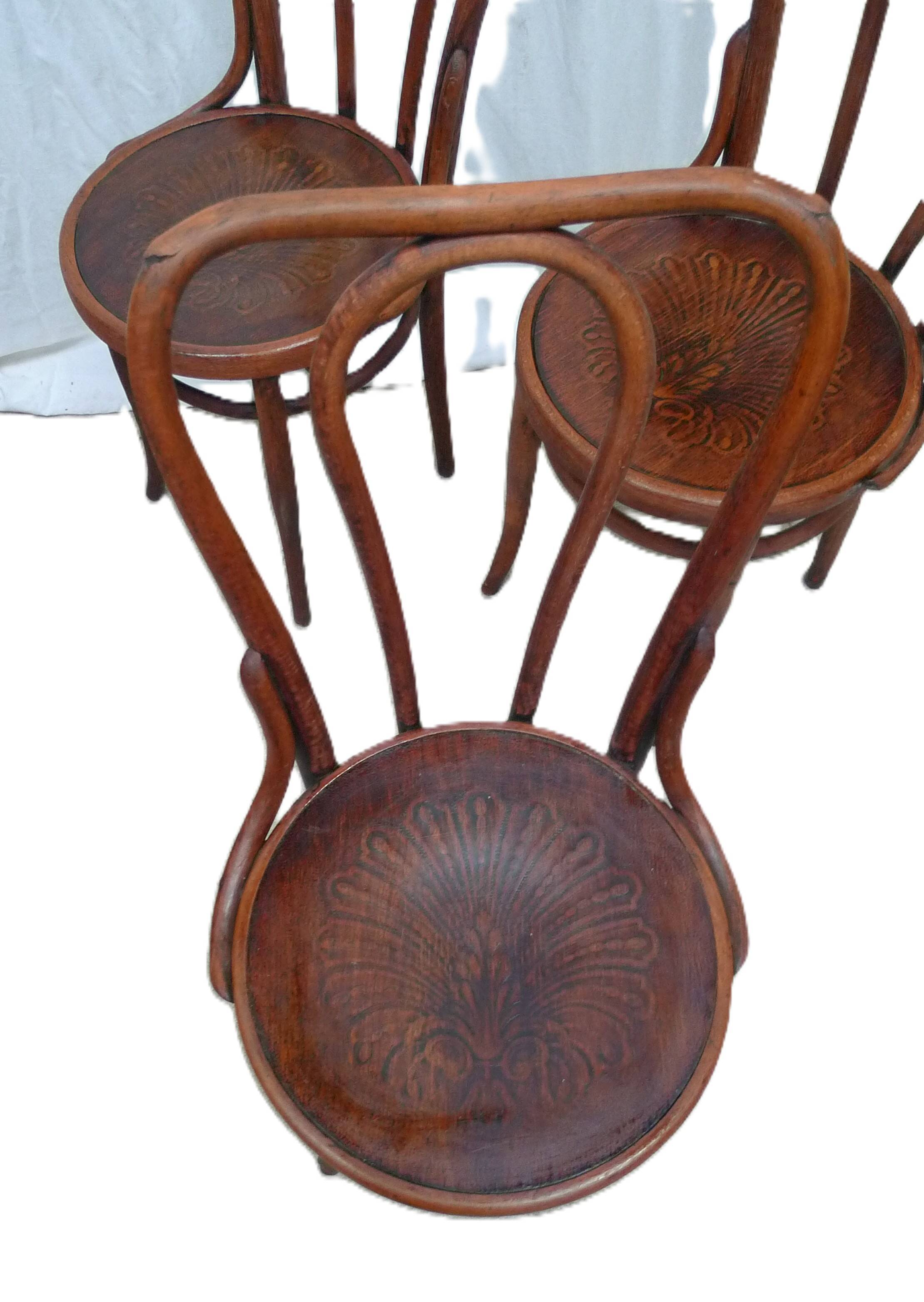 Set of four Jacob Kohn chairs.