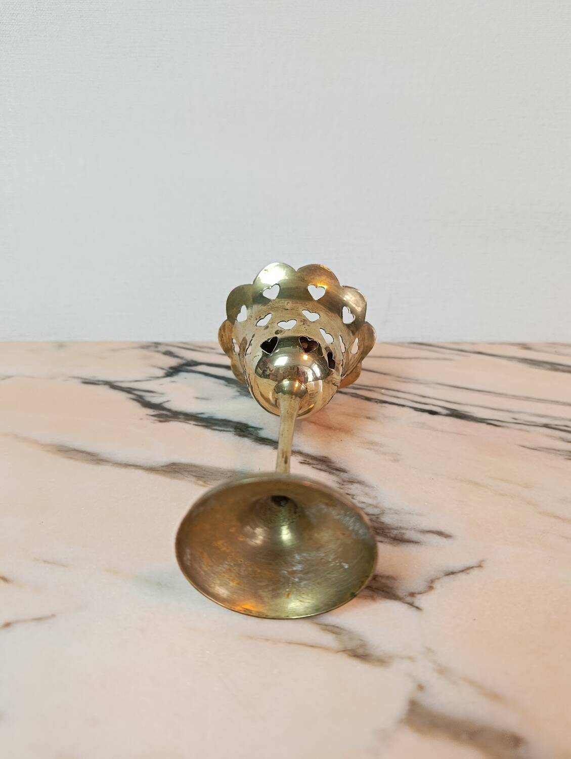 Lattice brass footed lantern with heart pattern