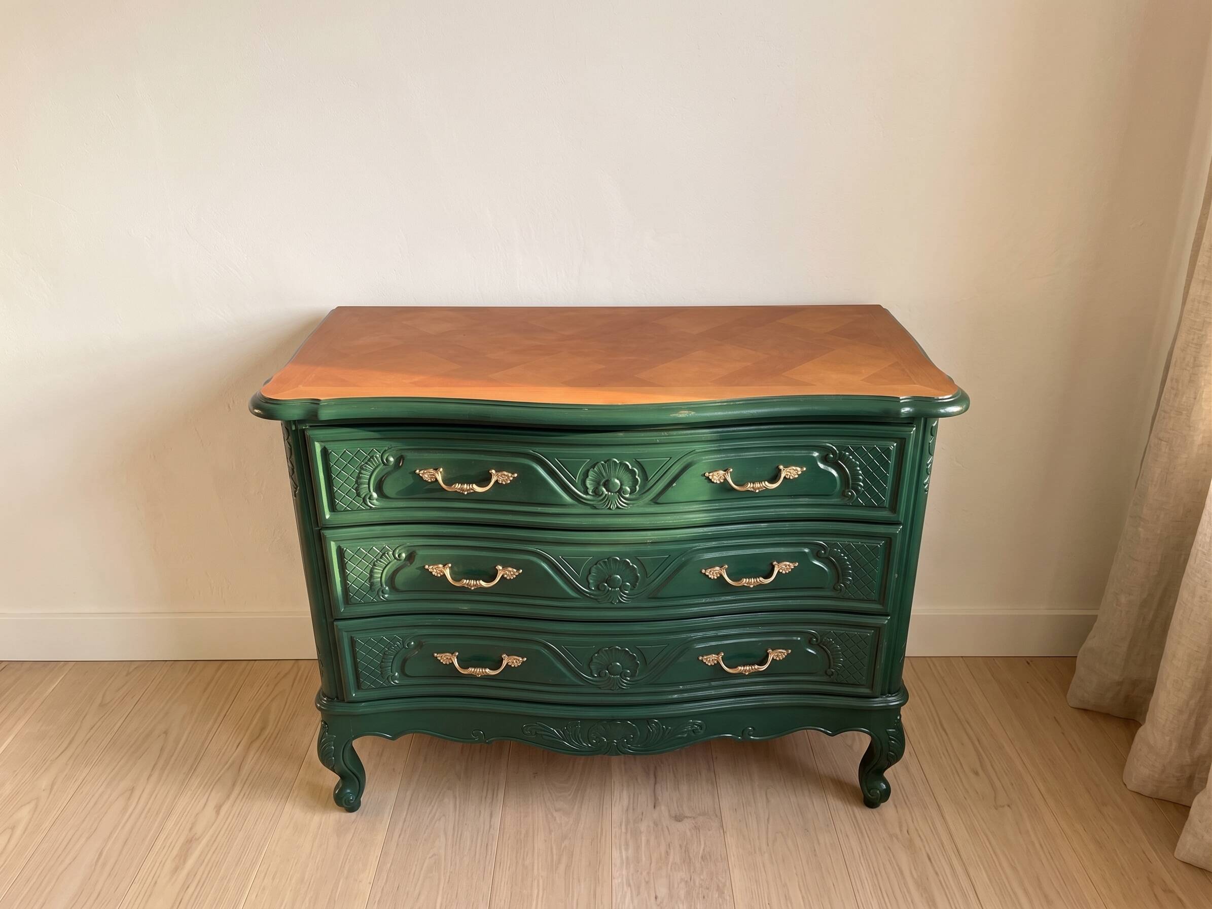 Restored cherry wood chest of drawers in English green.