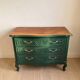 Restored cherry wood chest of drawers in English green.