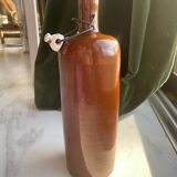 Old hot water bottle in glazed stoneware