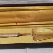 Old vermeil pie shovel, silver handle in his box