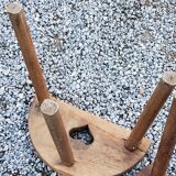 Pair of shepherd's stools in tripod oak décor in the heart