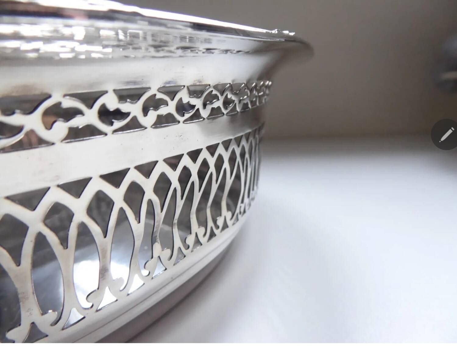 Large openwork basket in silver metal
