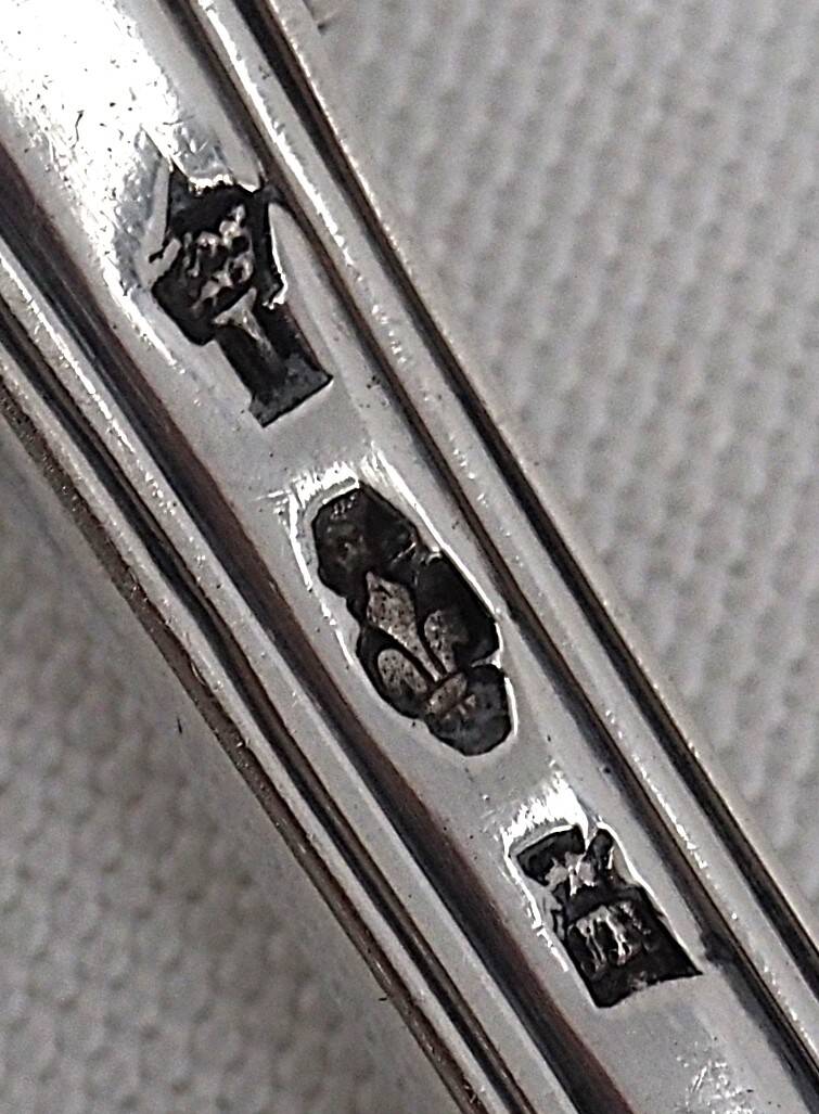 Serving spoon, silver, 18th century, straight thread pattern.