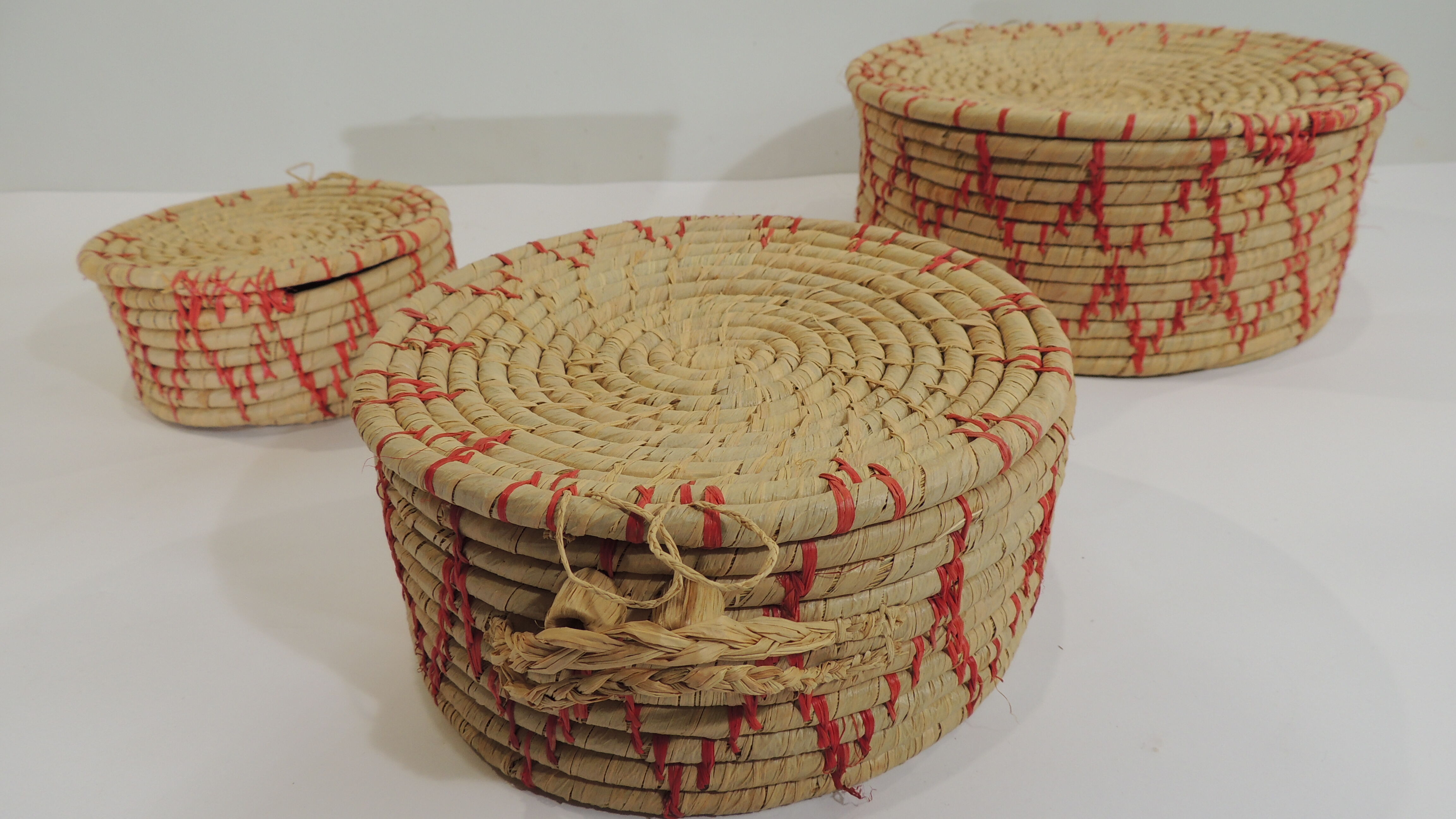Set of three african raffia basket