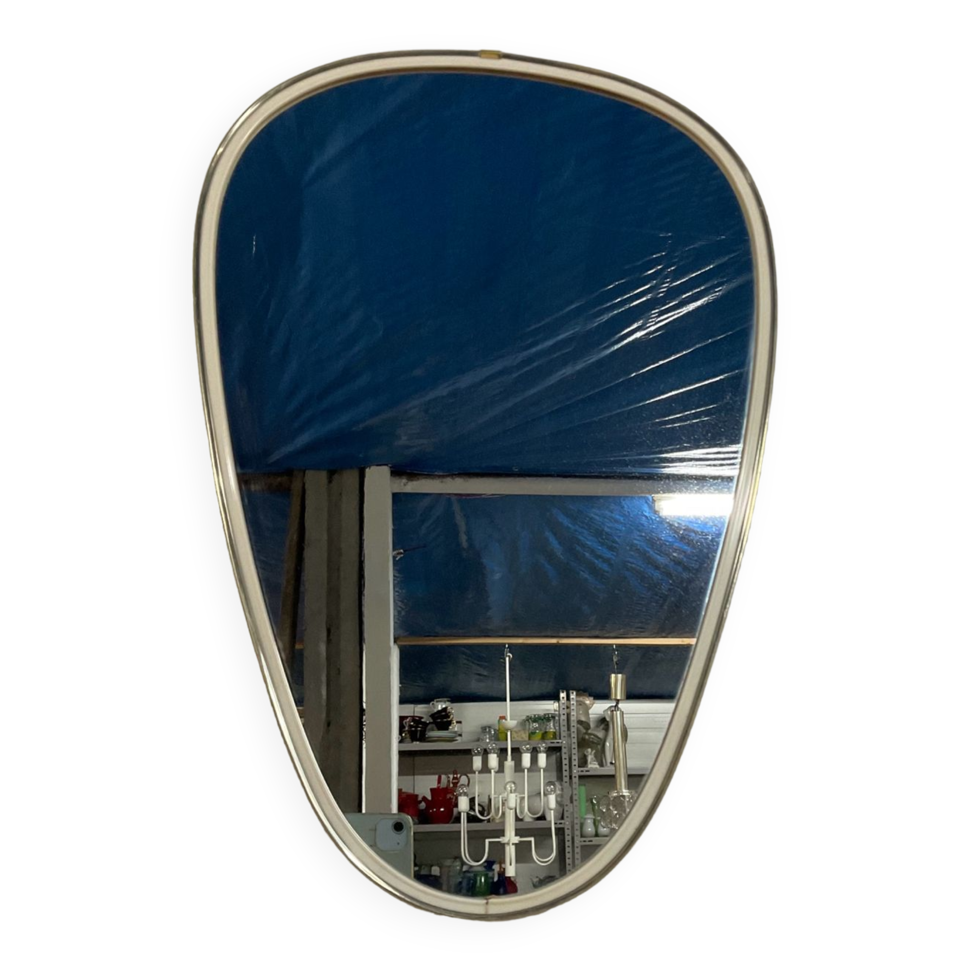 Asymmetrical free-form mirror from the 60s-70s
