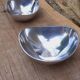 Pair of cast aluminum cups, 1970s