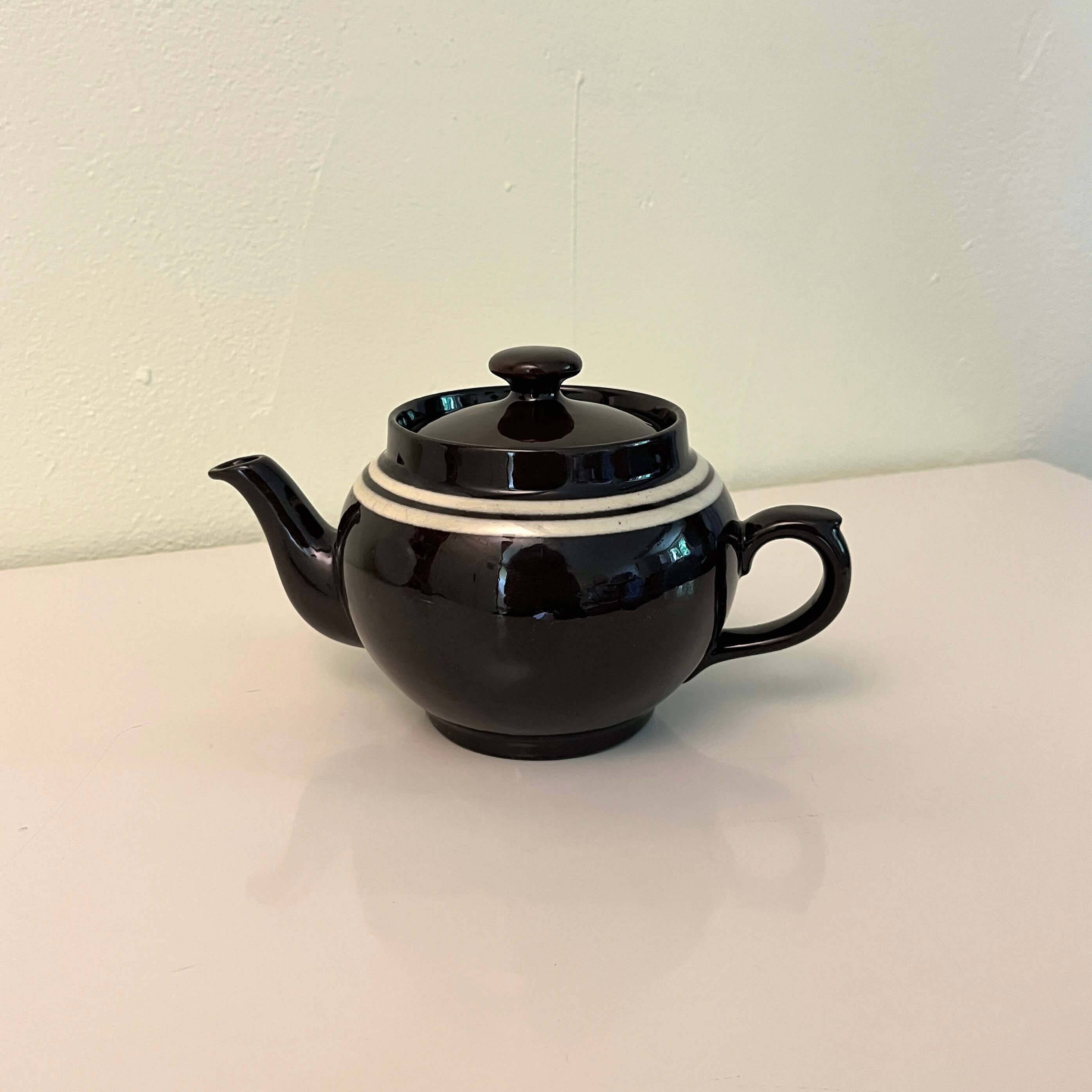 Brown ceramic teapot