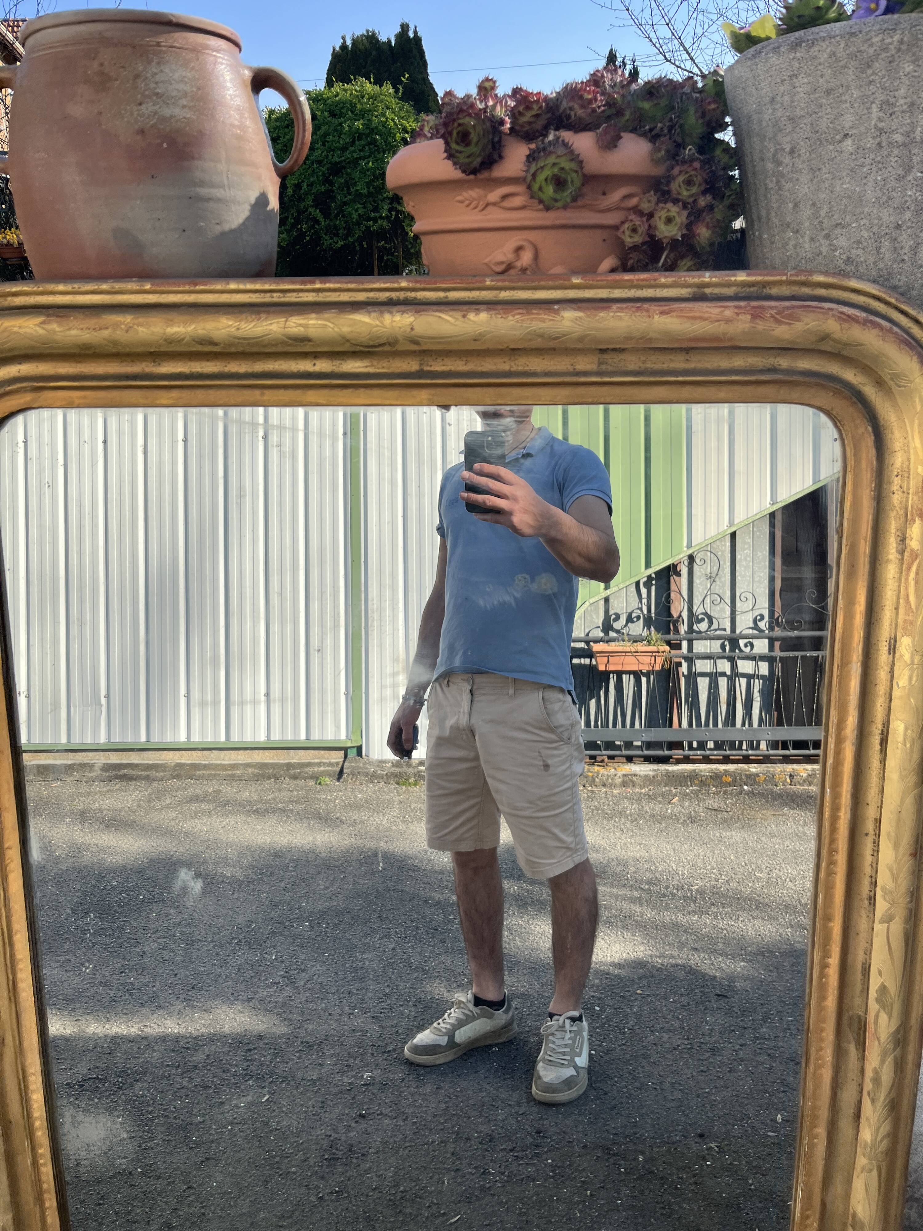 Large Louis-Philippe gilded mirror with gold leaf