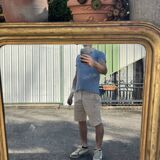 Large Louis-Philippe gilded mirror with gold leaf