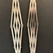 Paire de dessous de plat anciens extensibles métal argenté 1940