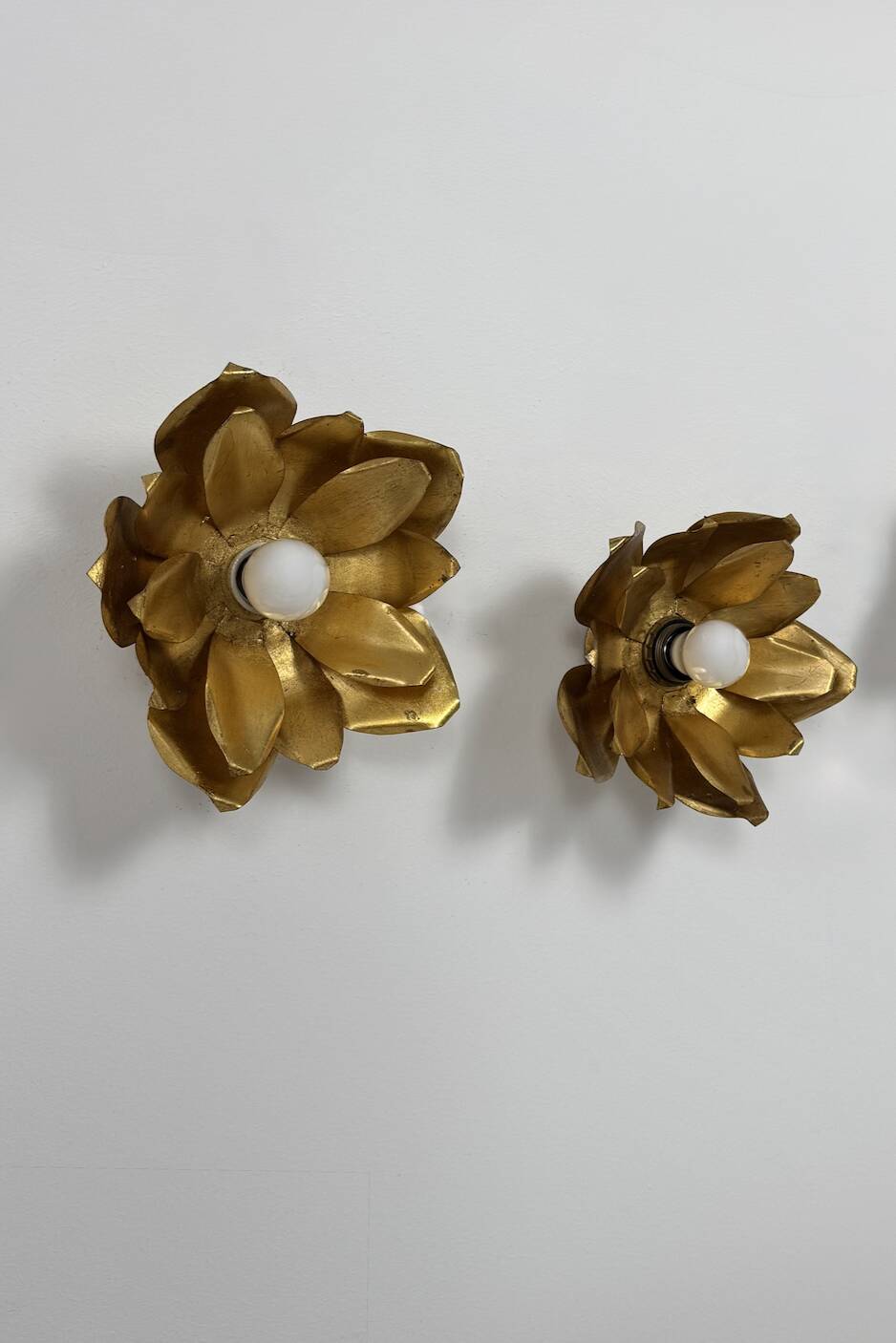 Pair of vintage flower wall lights, gilded metal, France, 1970.