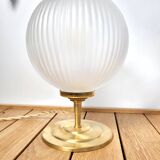 Vintage globe and brass table lamp