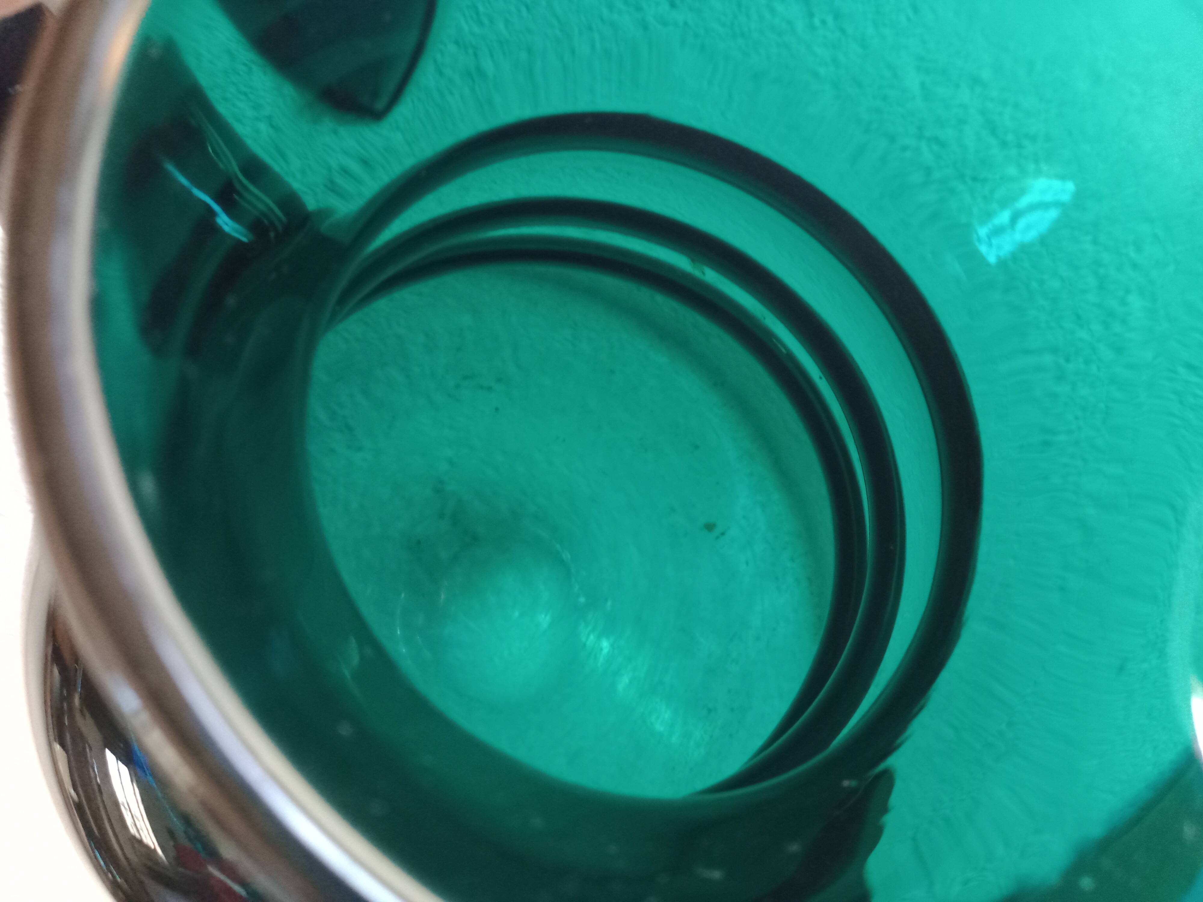 Deep green jug or pitcher with modern design - thick glass