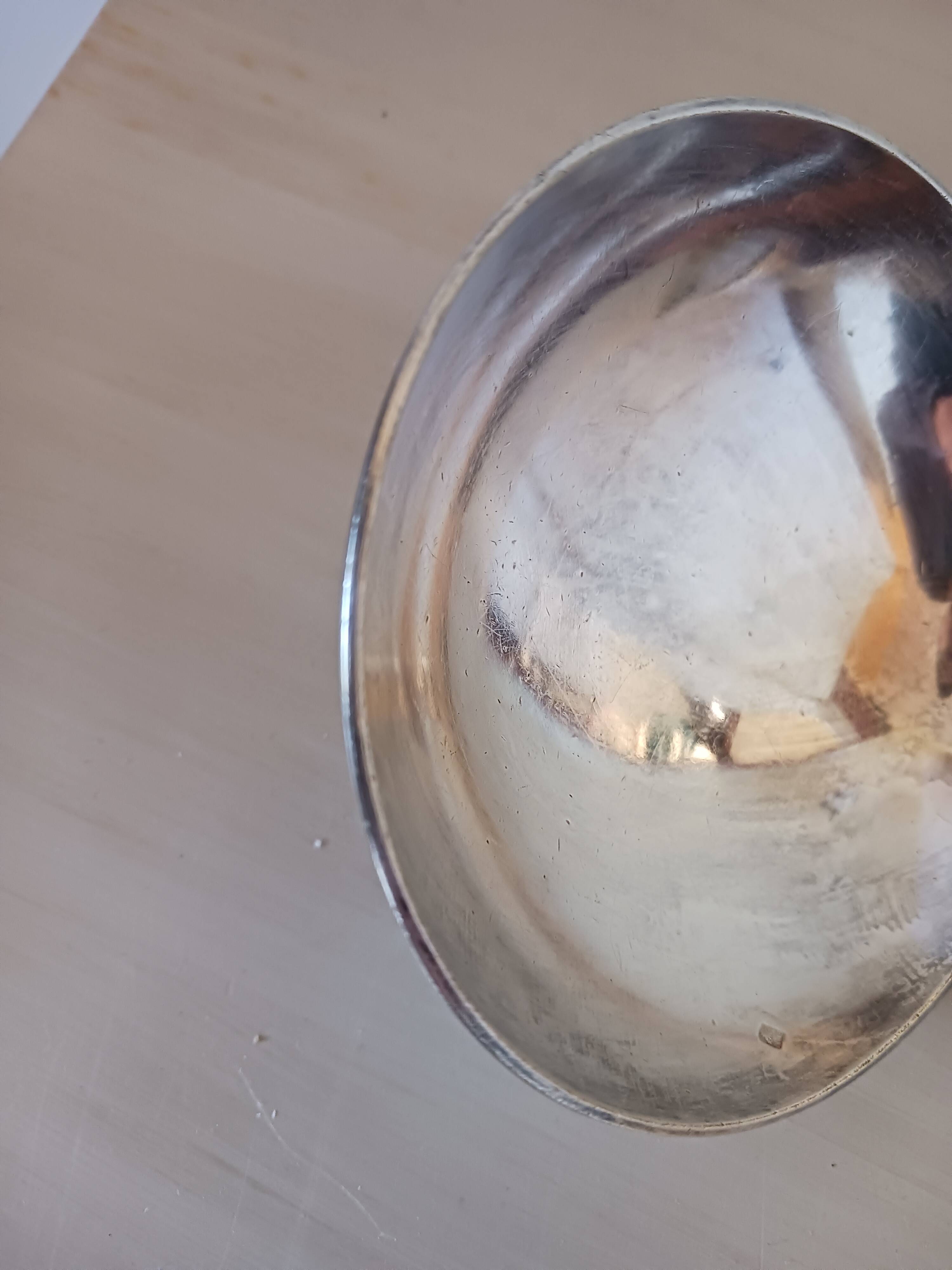 Silver-plated metal ladle, art deco motif.