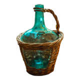 Dame Jeanne with her wicker case