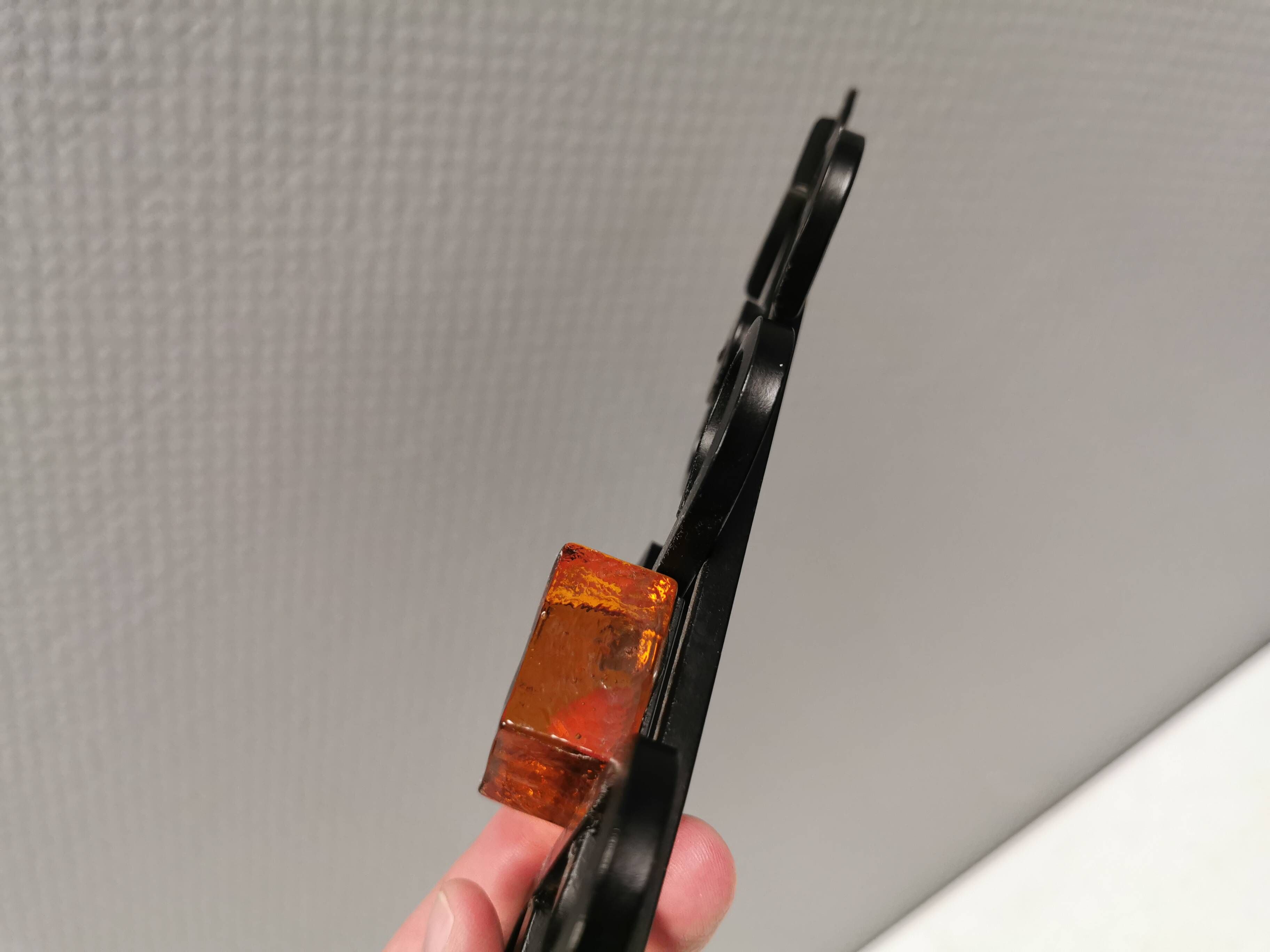 Vintage wall candle holder, wrought iron and  pressed orange/amber glass