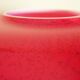 Pot-bellied, art deco vase in speckled ruby red multi-layered glass, white interior