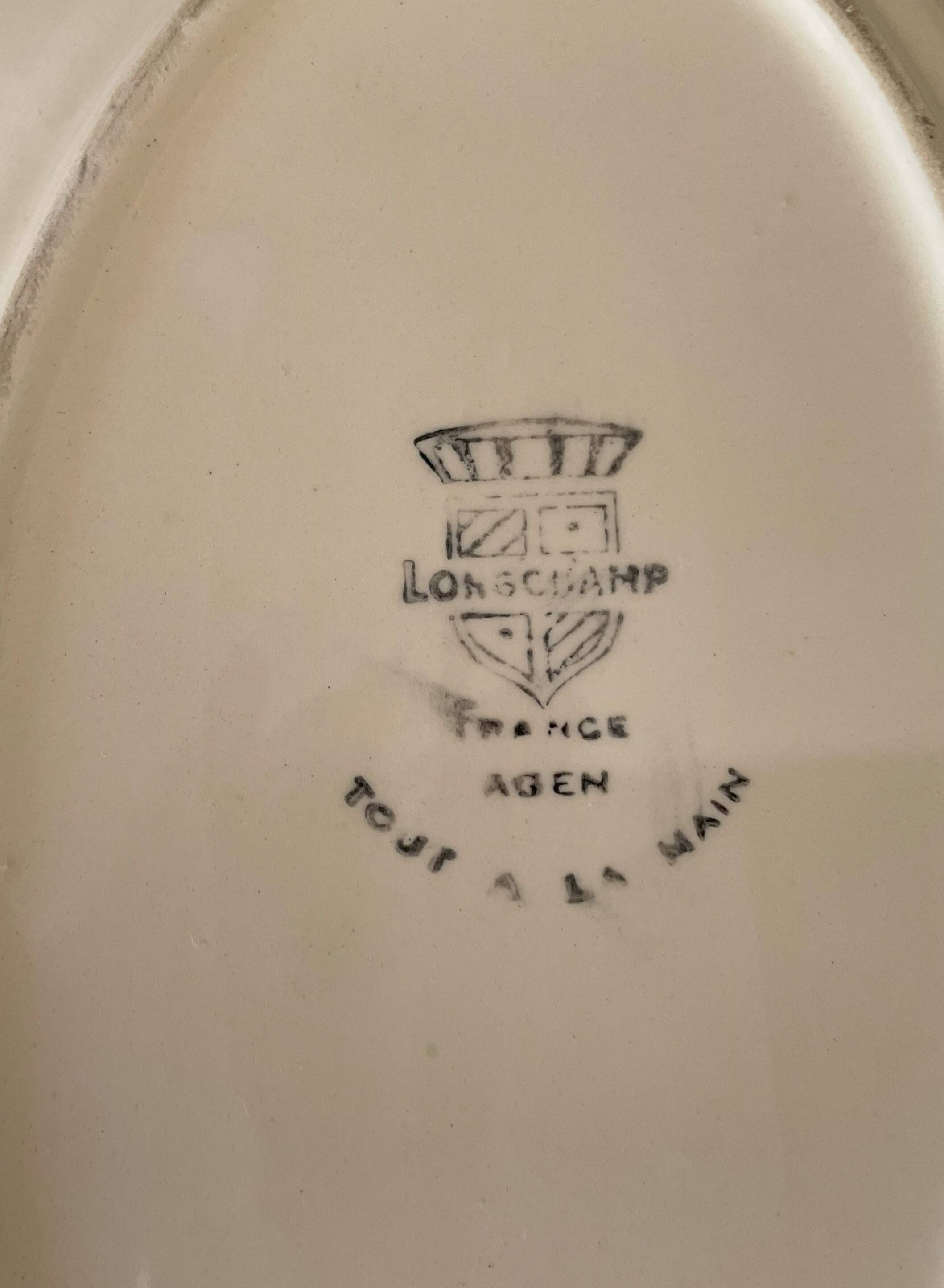 Pair of antique Longchamp earthenware raviers and sauceboats