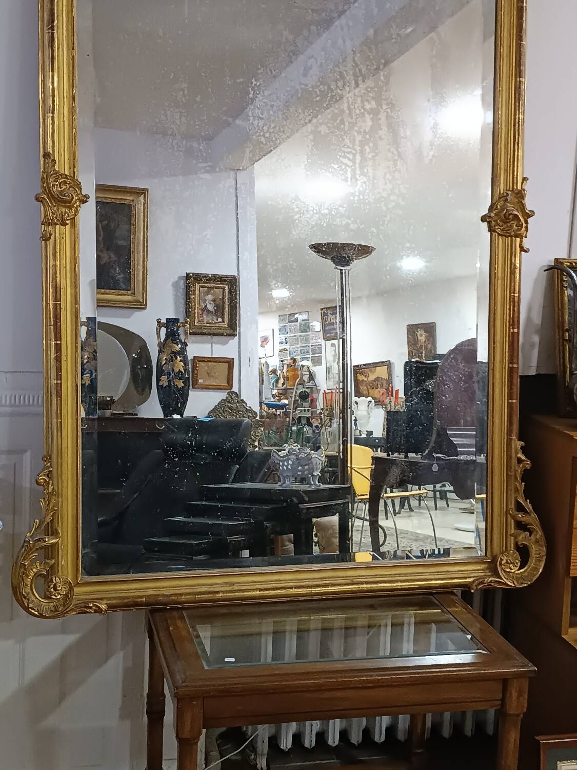 Large 19th century mirror gilded with gold leaf