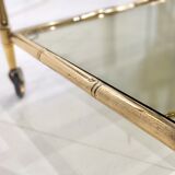 Golden metal dessert with tinted glass tops