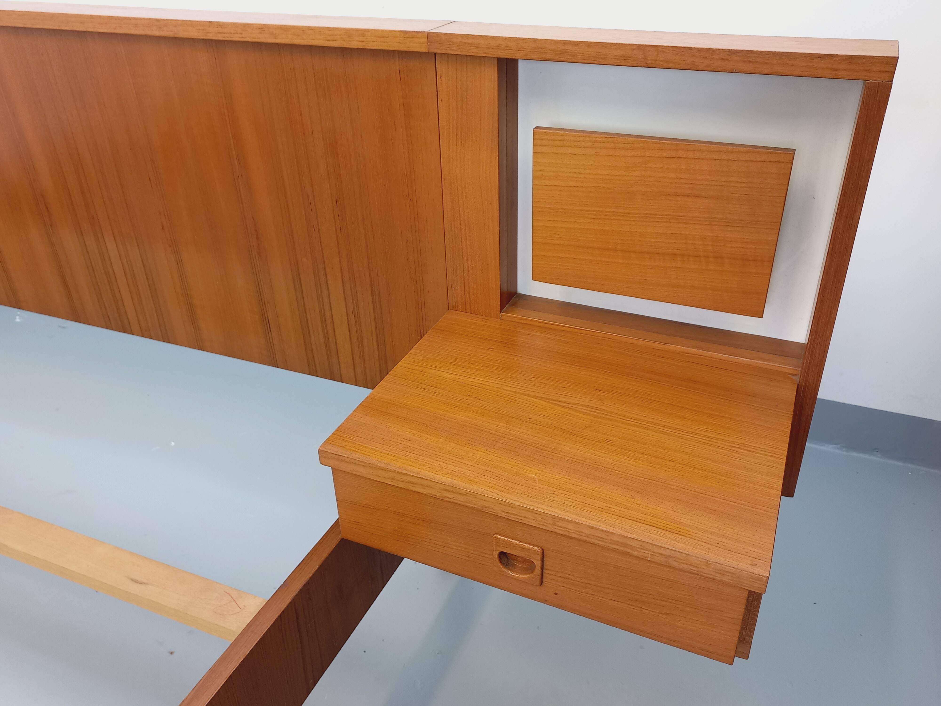 Vintage Scandinavian style double bed in teak from the 60s with integrated bedside lights