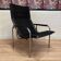Reclining armchair in black leather and chrome design "hans eichenberger" 1960.