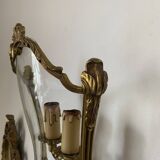 Wall lamp in Louis XV style in brass, shell decoration.