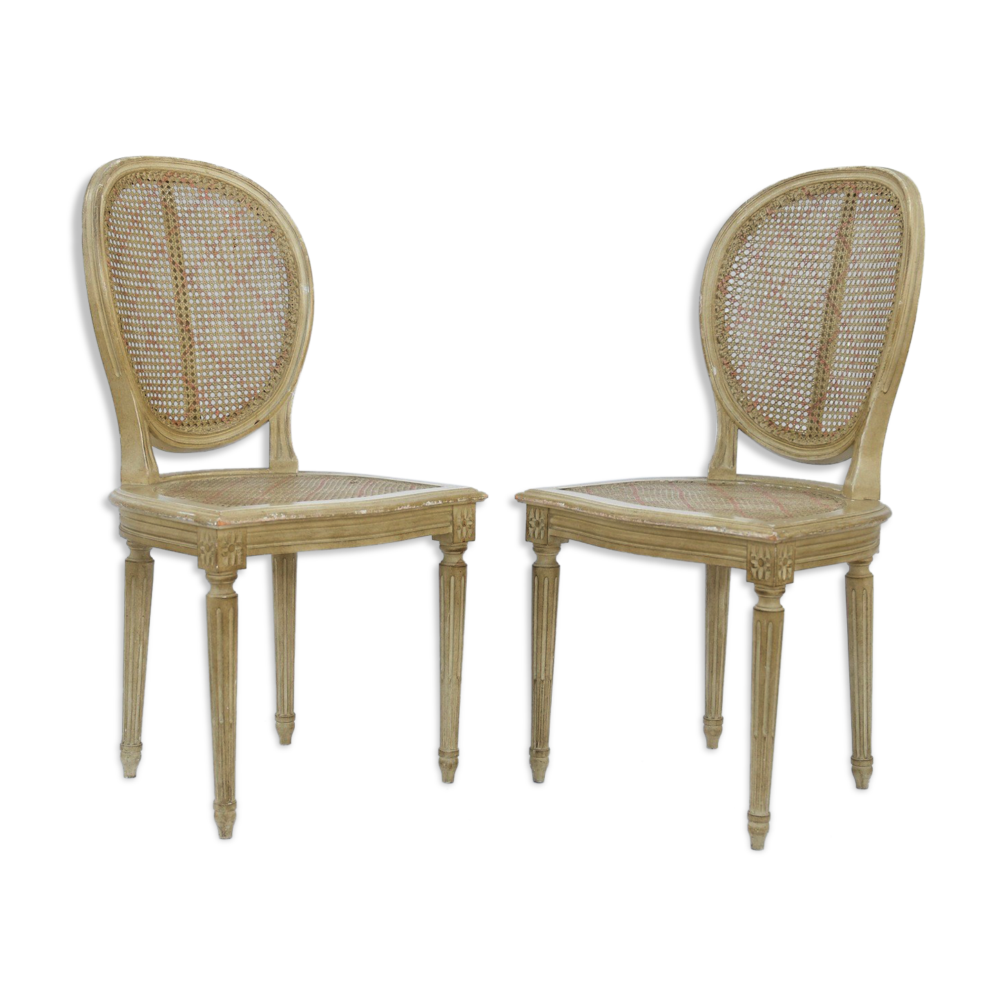 Pair of white canne and lay chairs