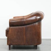 Characterful vintage sturdy 2-seater club sofa made of sheepskin leather