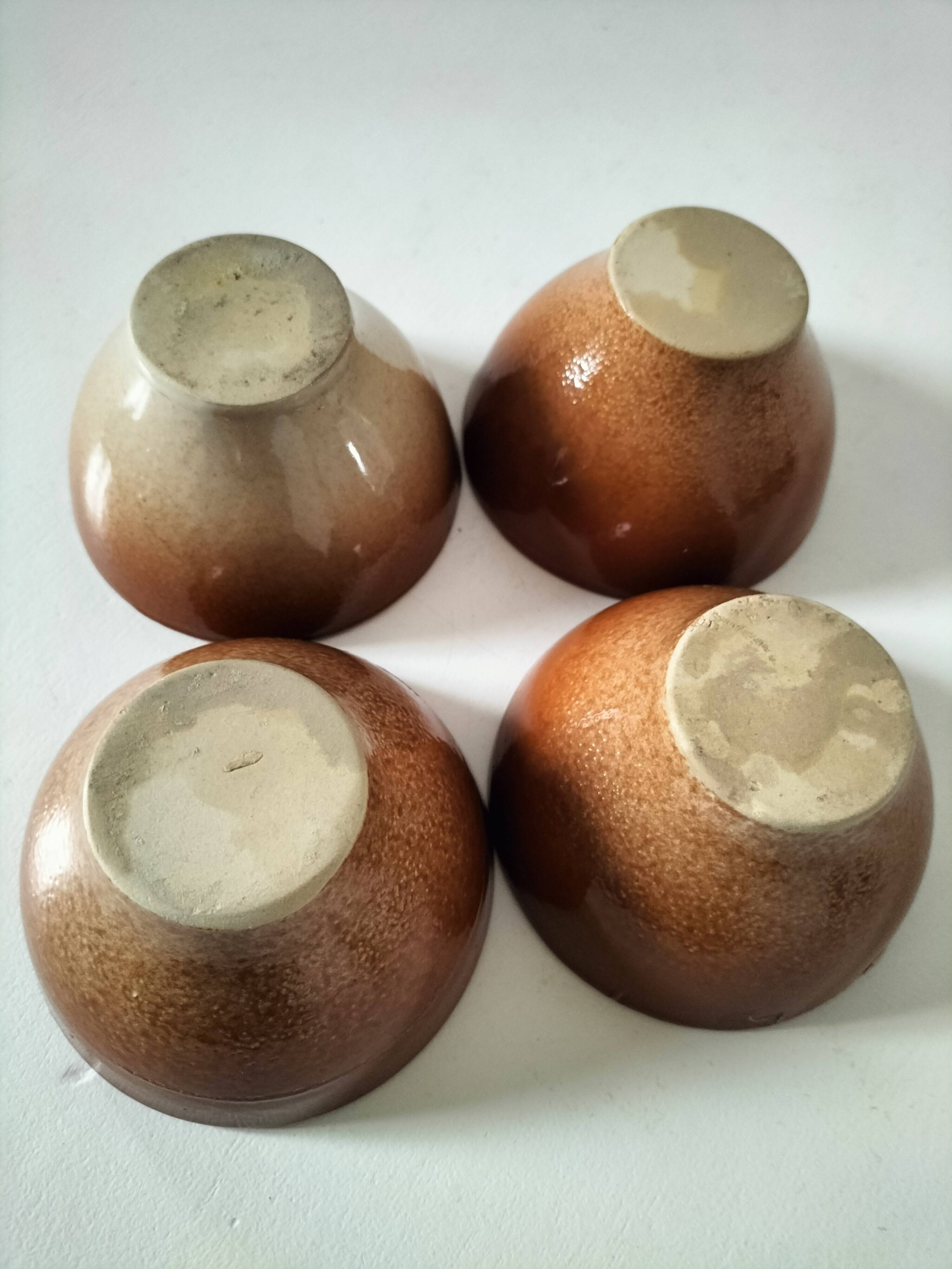 Set of 4 small glazed earthenware bowls