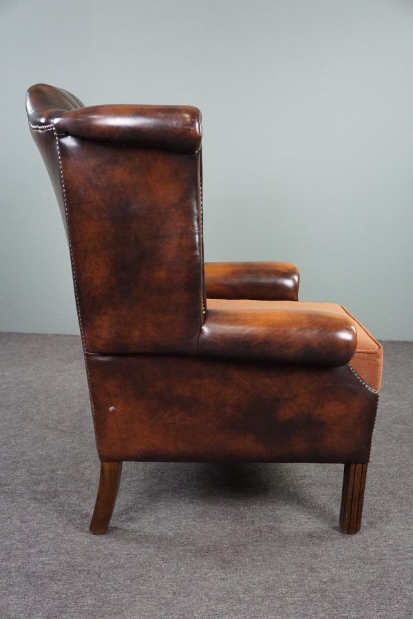 Chesterfield armchair with armrests
