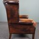 Chesterfield armchair with armrests