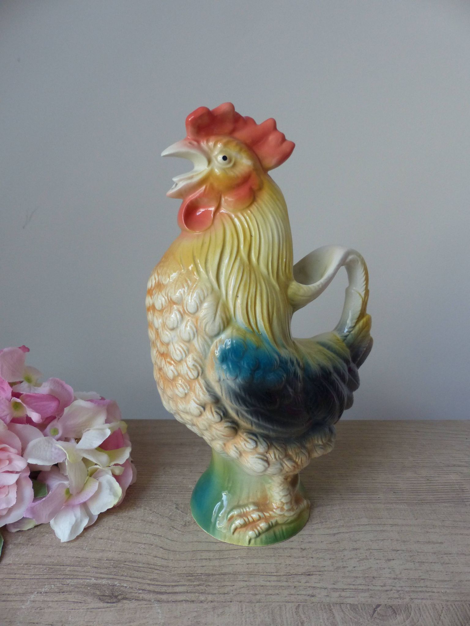 Vintage ceramic jug rooster – soft yellow and blue colours, vintage.