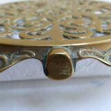 Worked copper trivet