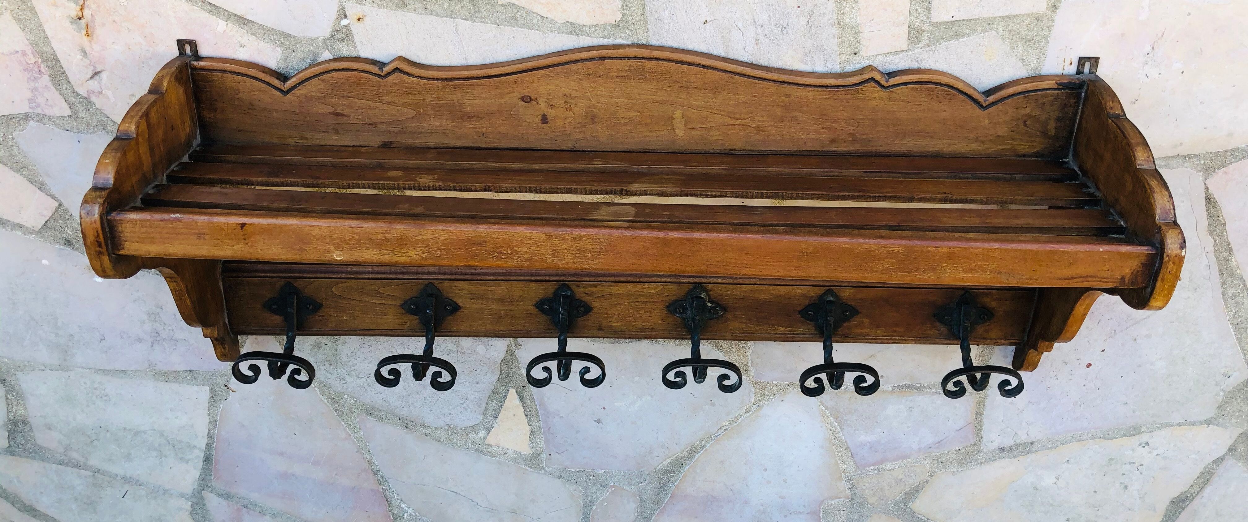 Old wooden wall coats door with six floors