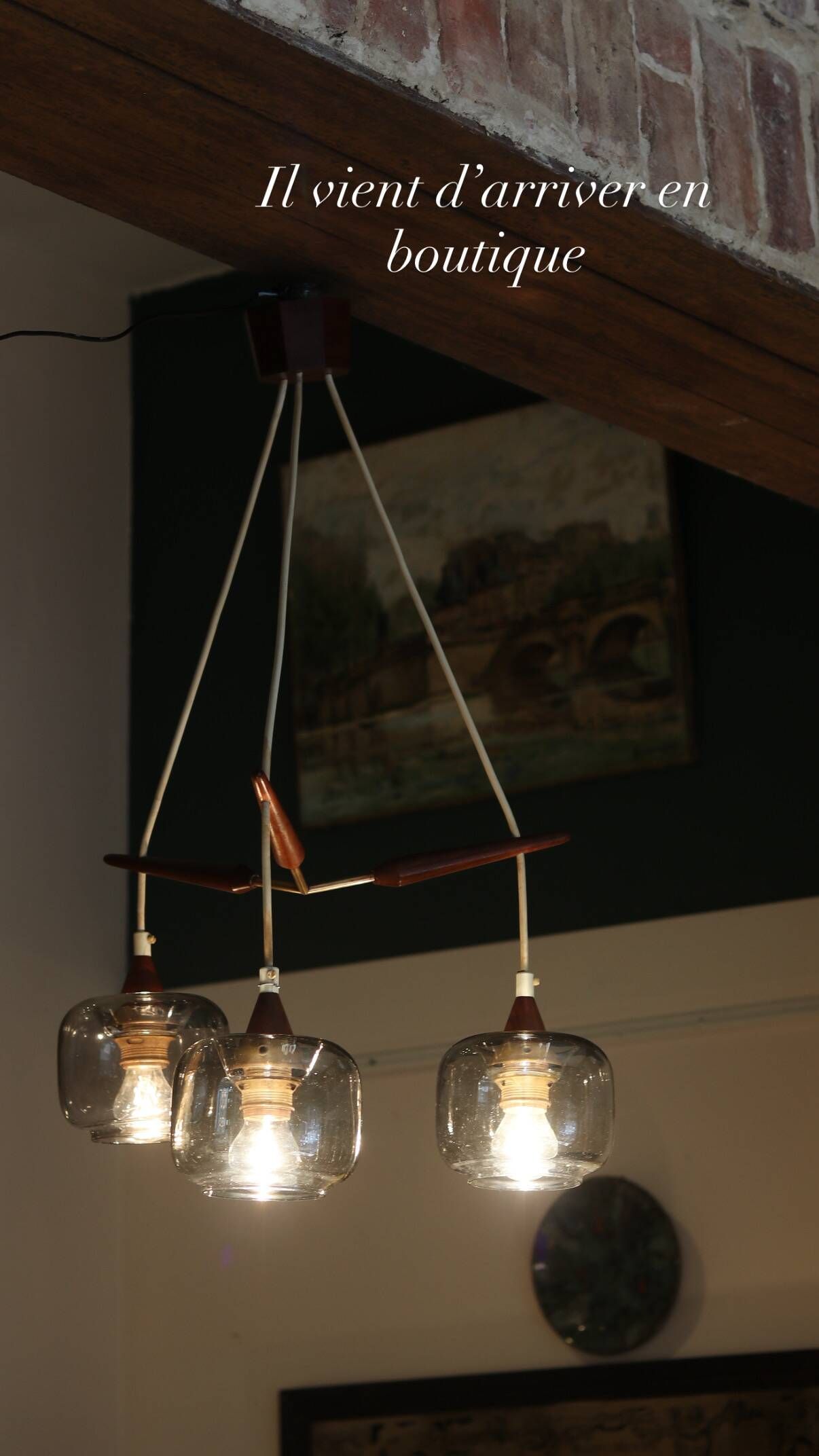 Scandinavian chandelier "Cascade" from the 1960s in brass, teak, and smoked glass.