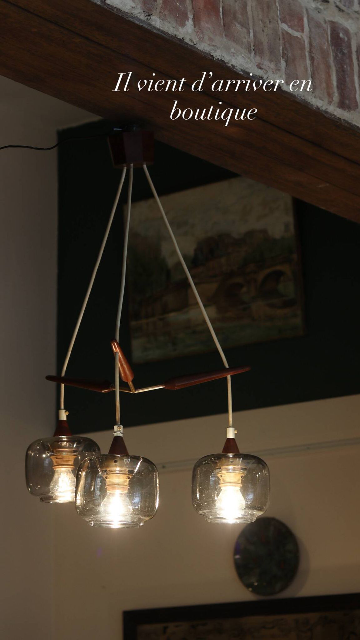Scandinavian chandelier "Cascade" from the 1960s in brass, teak, and smoked glass.