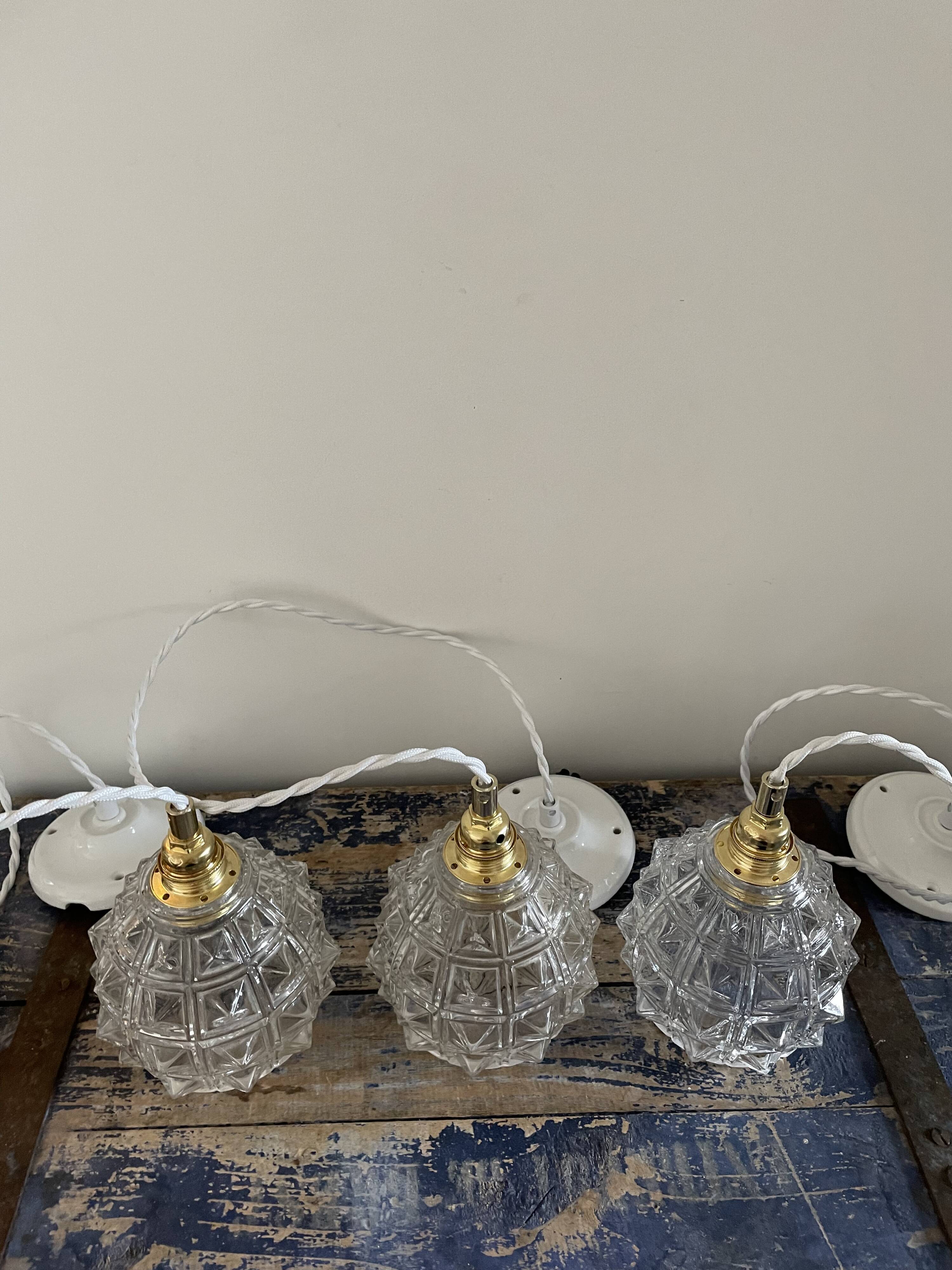 Set of three new electrified chiseled glass suspensions