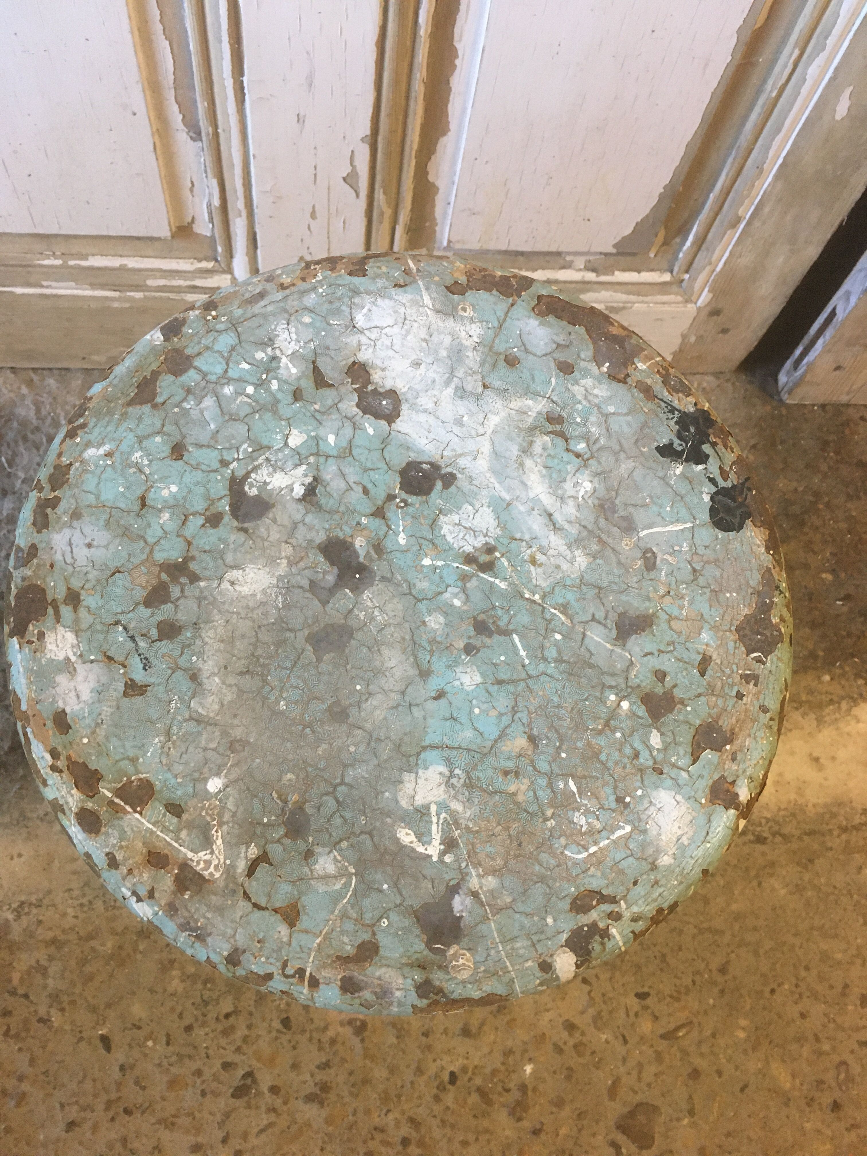 Patinated metal industrial stool