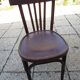 old bistro chair with varnished wooden bars