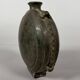 Nomadic rider's jug in green glazed earthenware, China, Tang Dynasty.