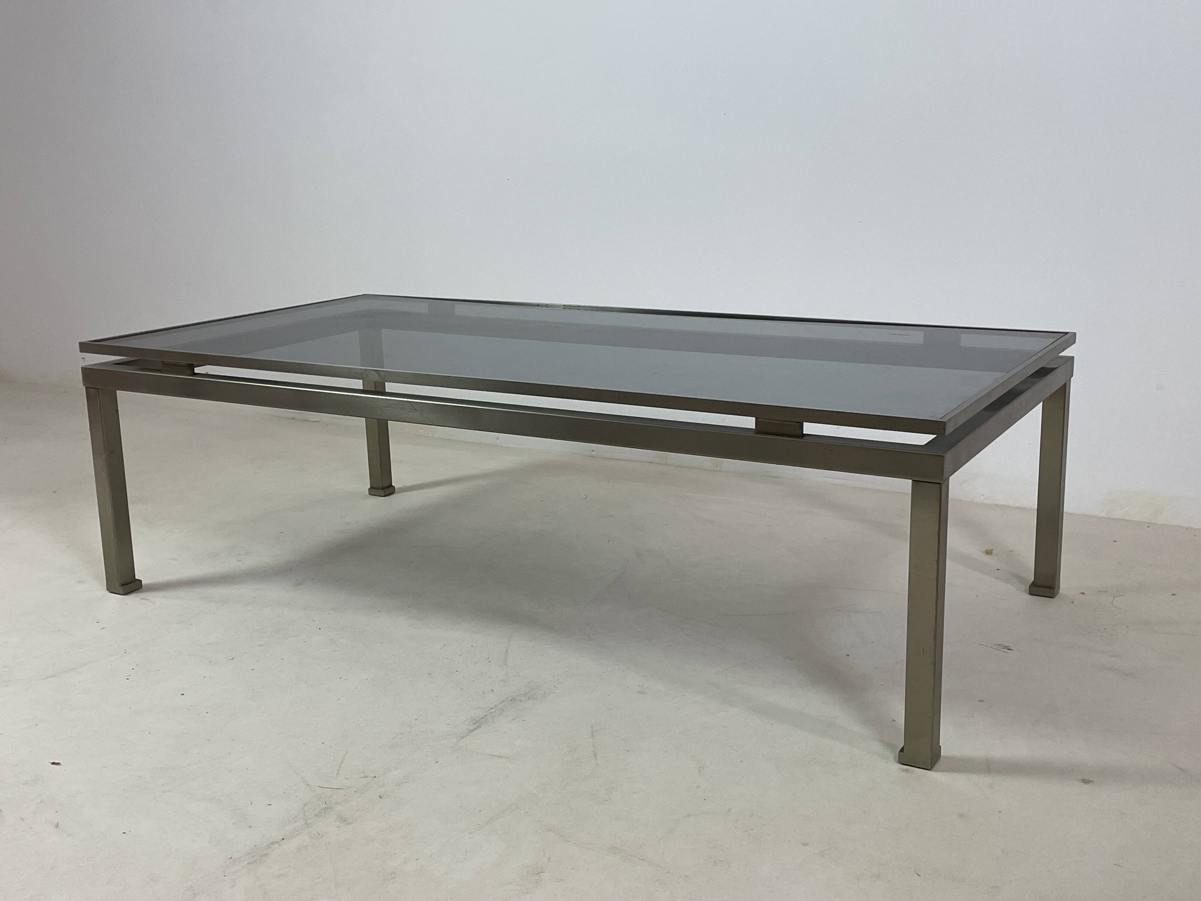 Brass coffee table with smoked glass top by Guy Lefevre, 1970s