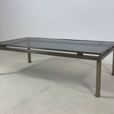 Brass coffee table with smoked glass top by Guy Lefevre, 1970s