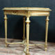 Guéridon d'apparat Louis XVI en bois laqué doré