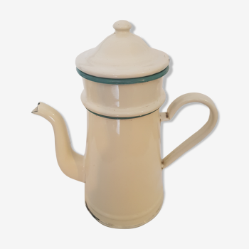 Old pale yellow enamelled coffee maker with filters