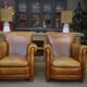 Paire de fauteuils club vintage en cuir
