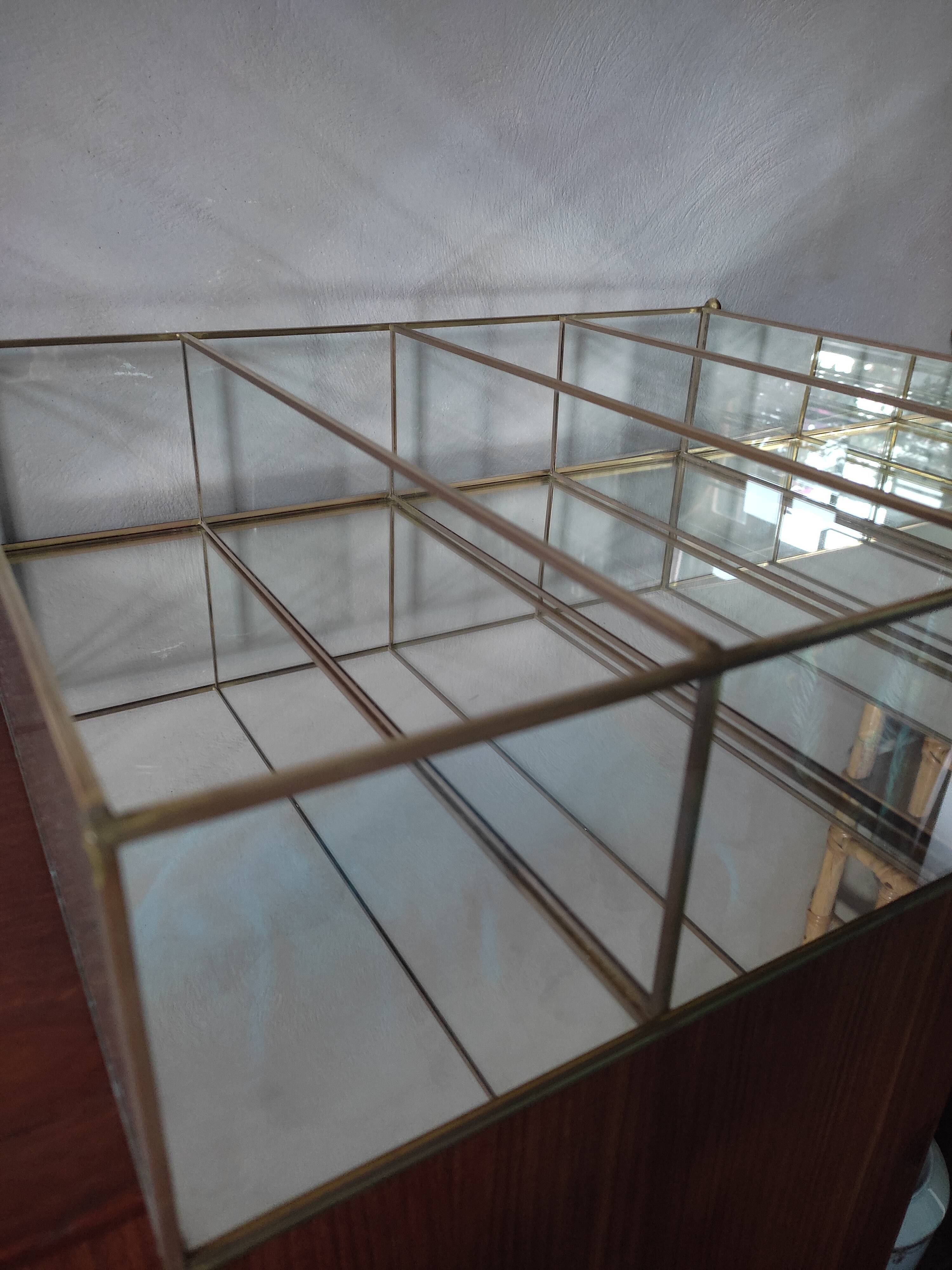 Glazed brass shelf to install