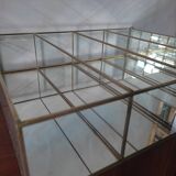 Glazed brass shelf to install